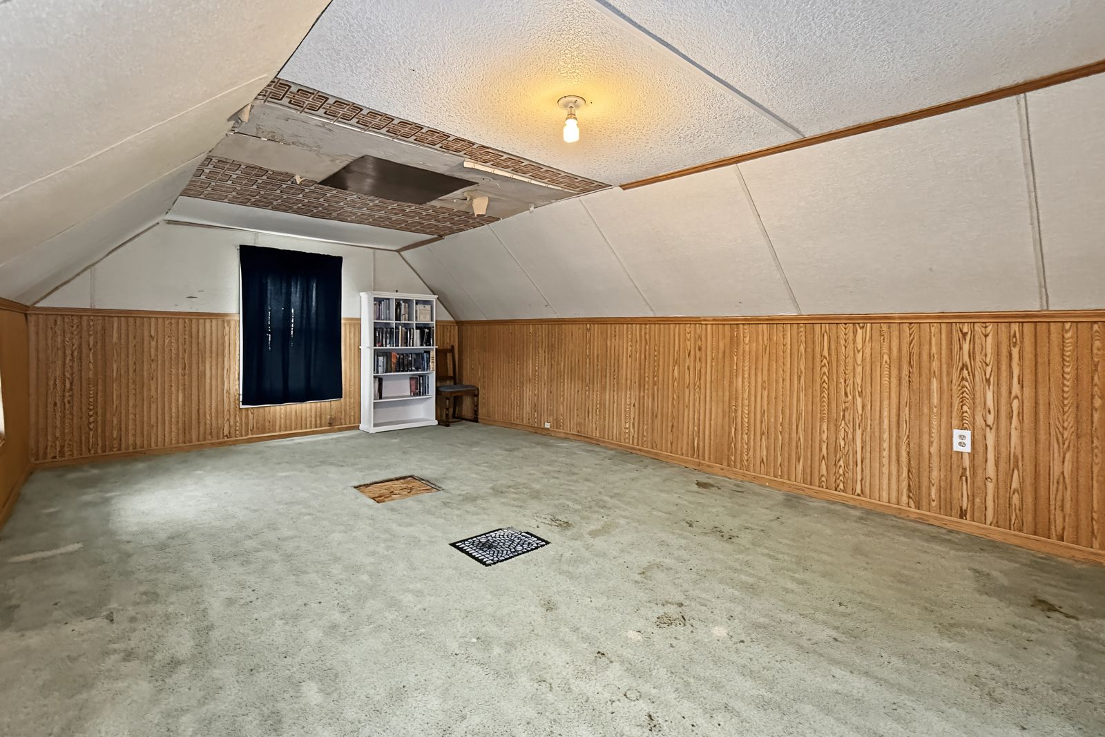 260 County Line Rd, Runnells — Large upstairs room with sloped ceiling