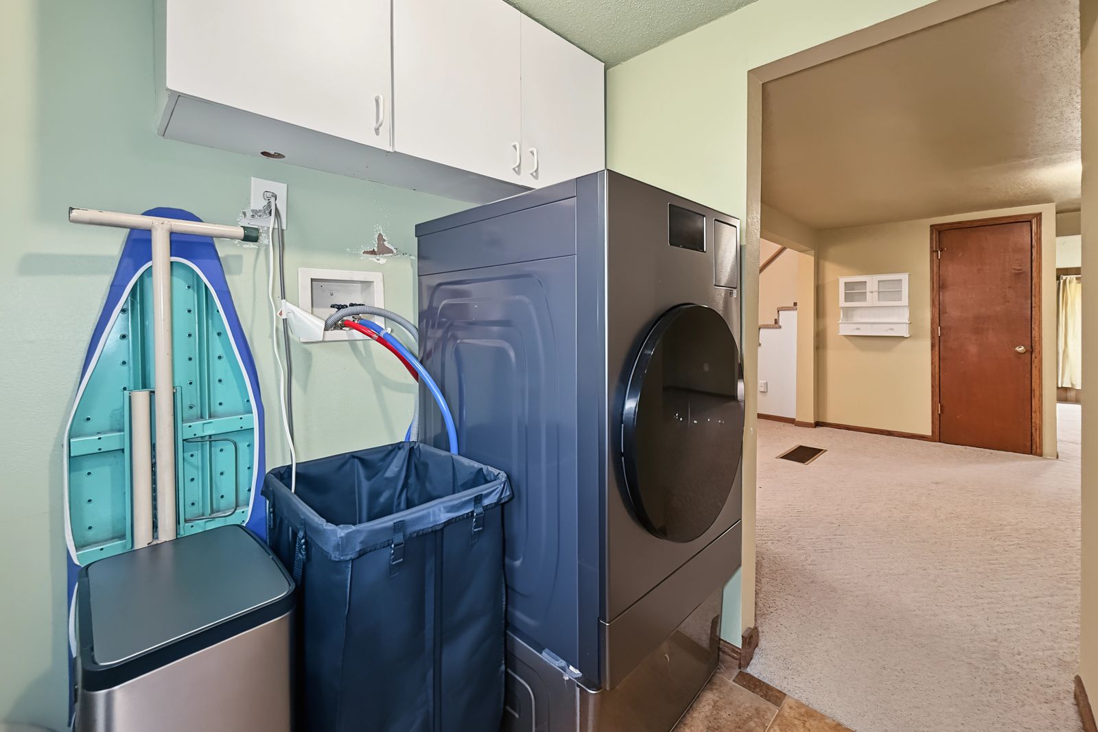 260 County Line Rd, Runnells — First-floor laundry room