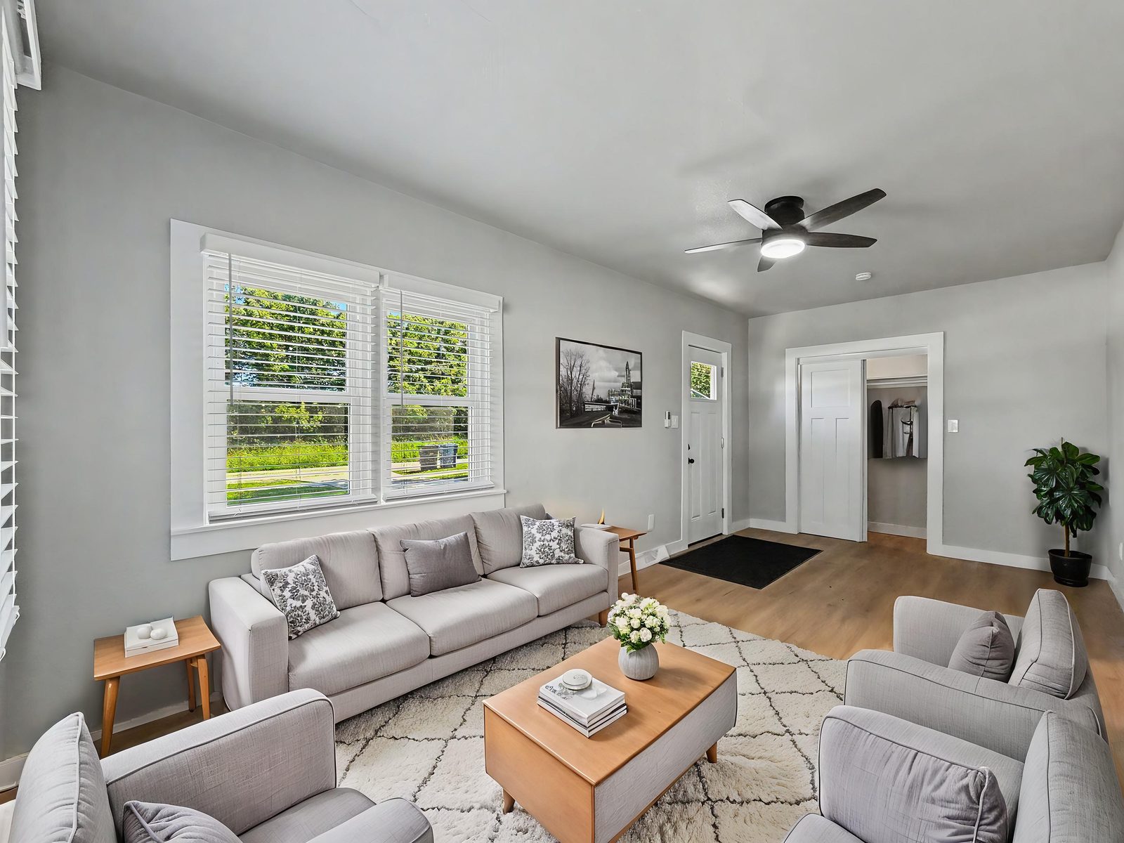 3436 Scott Ave, Des Moines — living room and entry, virtually staged