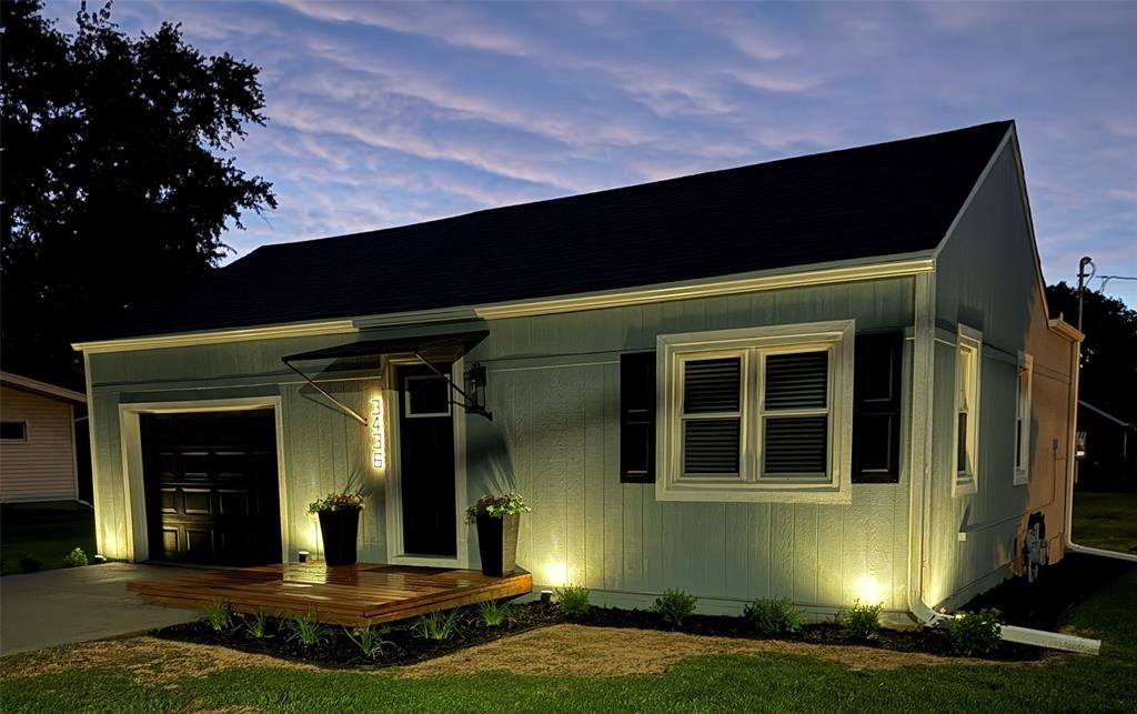 Exterior of fully renovated 3-bedroom ranch at 3436 Scott Ave Des Moines Iowa 50317 with new landscaping